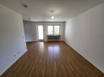 Familienfreundliche 4-Zimmer-Wohnung mit Loggia in Oberhausen zu vermieten - Wohnzimmer