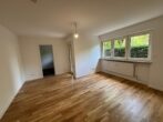 Erdgeschoss-1,5-Zimmer-Wohnung mit Garten in ruhiger Lage von Neuperlach Süd - Wohnzimmer