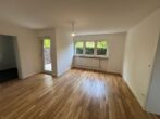 Erdgeschoss-1,5-Zimmer-Wohnung mit Garten in ruhiger Lage von Neuperlach Süd - Wohnzimmer mit Terassenausgang
