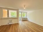 Befristete 3-Zimmer-Wohnung mit Balkon - Wohnzimmer Ansicht 1