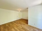 Befristete 3-Zimmer-Wohnung mit Balkon - Wohnzimmer Ansicht 2