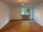 Helle 4-Zimmer-Wohnung mit Balkon und Parkett in München-Blodigstraße - Wohnzimmer