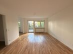 4-Zimmer-Wohnung im Erdgeschoss mit Balkon und 84,25 m² in München – Wellenkampstraße - Wohnzimmer