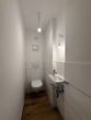 Helle 3-Zimmer-Wohnung mit Balkon und Parkblick in Haar-Jagdfeldring - Moderne Gäste-Toilette
