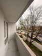 2-Zimmer-Wohnung mit Balkon und Parkblick in Haar-Jagdfeldring - Balkon mit Straßenblick