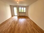 3-Zimmer-Erdgeschosswohnung mit Garten in ruhiger Lage von Neuperlach Süd - Wohnzimmer