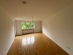 Familienfreundliche 3,5-Zimmer-Wohnung in München Neuperlach - Wohnzimmer