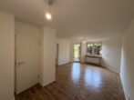Terrassenwohnung mit 1,5 Zimmern und Parkett in München - Helles Wohnzimmer