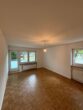 3-Zimmer-Wohnung mit Balkon und Parkett in München-Oskar-Maria-Graf-Ring - Helles Wohnzimmer mit Parkett
