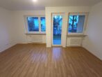 Helle 3-Zimmer-Wohnung mit Terrasse in Vogelloh - Wohnzimmer